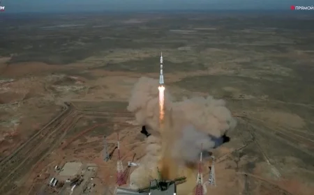 Rocket carrying NASA's Jonny Kim, 2 cosmonauts docks with space station